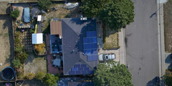 Drone flying over roofs for hail damage detection in Colorado